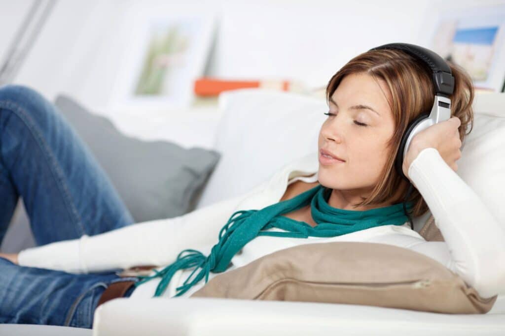 young woman listening to music